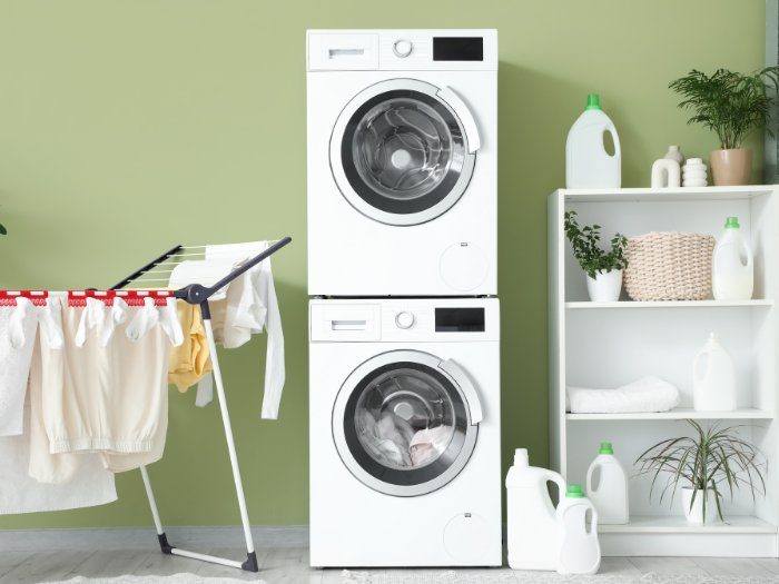Dryer vent cleaning in Huntsville AL — laundry room dryer machine maintained by certified technician
